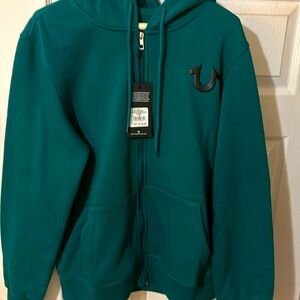 TRUE RELIGION ZIP UP HOODIE. Brand new with tags. It is a medium.